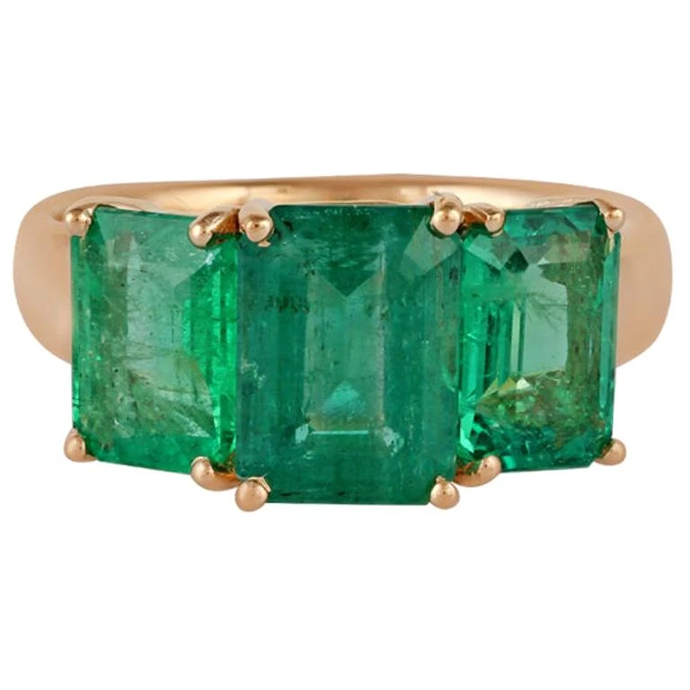 Emerald Ring Studded In 18 Karat Yellow Gold 3 Emerald Ring Studded In 18 Karat Yellow Gold