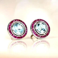 Unknown 2.30 Carat Aquamarine Earrings, Ruby Halo, Platinum 9 Unknown 2.30 Carat Aquamarine Earrings, Ruby Halo, Platinum -Mode Bijouterie Magasin 13252 Artistic 1000x1000 1 1 master