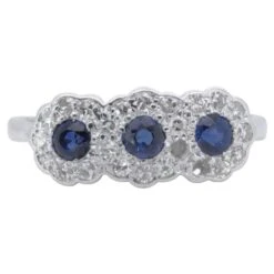 Platinum 3 Stone Ring With 0.5 Carat Natural Sapphire And Diamonds NGI Cert