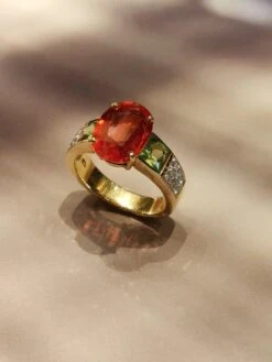 Unknown 3.86 Carat Oval Orange Sapphire Diamond Pavé Ring Flanked With Square Peridots -Mode Bijouterie Magasin 75325 e master