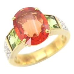 Unknown 3.86 Carat Oval Orange Sapphire Diamond Pavé Ring Flanked With Square Peridots