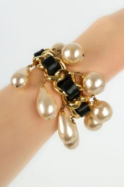 Chanel Gold Metal And Black Leather Bracelet, 1990's 19 Chanel Gold Metal And Black Leather Bracelet, 1990's -Mode Bijouterie Magasin BRAB136 9 master