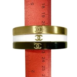 Vintage Chanel Bangle Set Of 3: In Gold Tone, White, & Black Resin With CC Logo -Mode Bijouterie Magasin BWG ON RULER master
