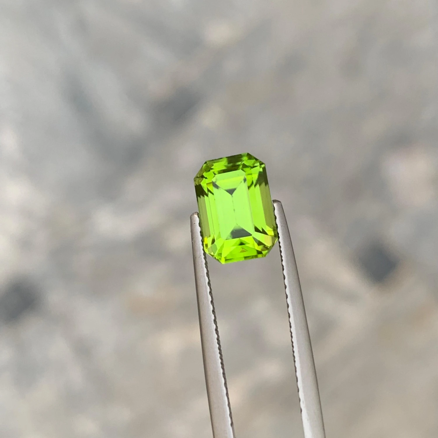 Unknown 3.30 Carat Apple Green Loose Peridot From Pakistan With Emerald Shape 4 Unknown 3.30 Carat Apple Green Loose Peridot From Pakistan With Emerald Shape – Image 2