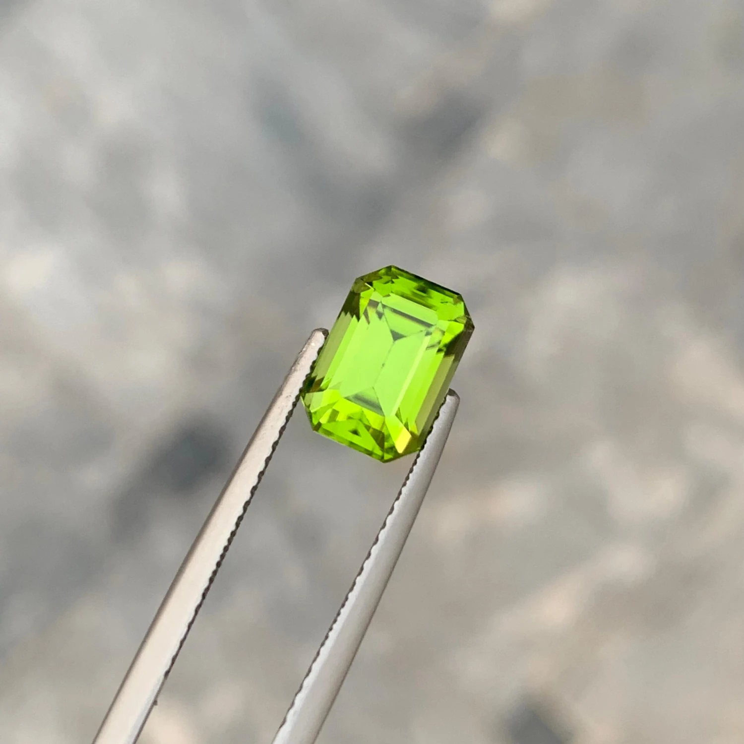 Unknown 3.30 Carat Apple Green Loose Peridot From Pakistan With Emerald Shape 7 Unknown 3.30 Carat Apple Green Loose Peridot From Pakistan With Emerald Shape – Image 5