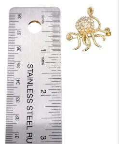 Unknown Delightful 14 Karat Polished Yellow Gold Octopus Brooch / Pendant With Diamonds 27 Unknown Delightful 14 Karat Polished Yellow Gold Octopus Brooch / Pendant With Diamonds -Mode Bijouterie Magasin PhotoRoom 20230327 141355 1 master