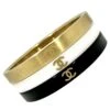 Vintage Chanel Bangle Set Of 3: In Gold Tone, White, & Black Resin With CC Logo 2 Vintage Chanel Bangle Set Of 3: In Gold Tone, White, & Black Resin With CC Logo -Mode Bijouterie Magasin v 13956802 1686593687390 bg processed